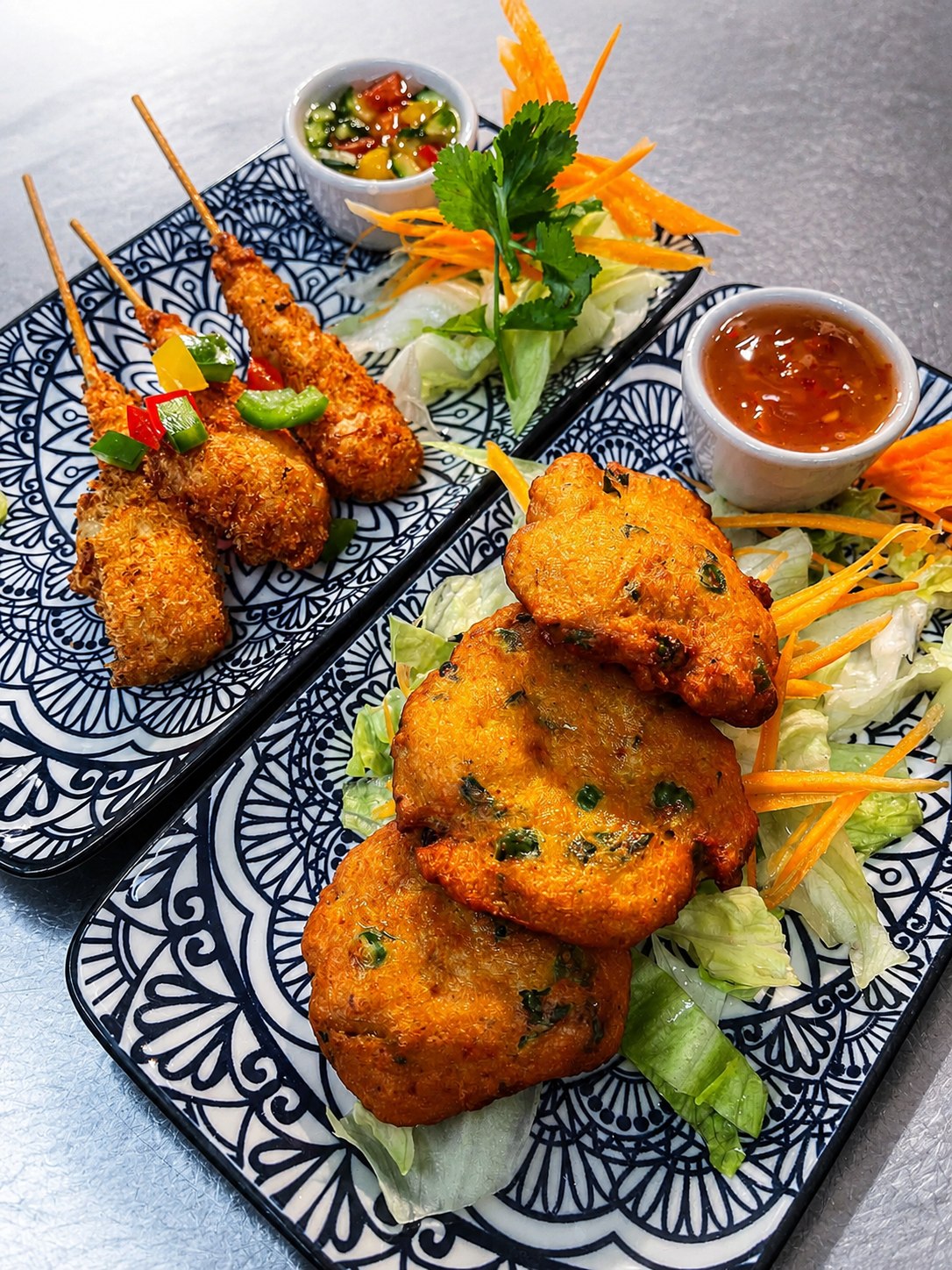 Thai fish cakes and satay skewers with dipping sauces